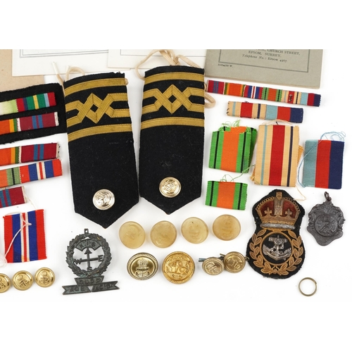 2476 - A collection of naval militaria relating to Lieutenant Commander Derek George Green of The Royal Eas... 