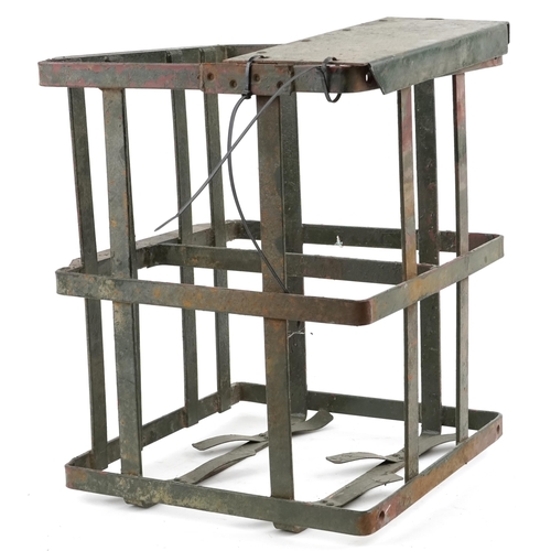 2538 - A military interest painted steel bomb cage, 48cm H x 38cm W x 38cm D.