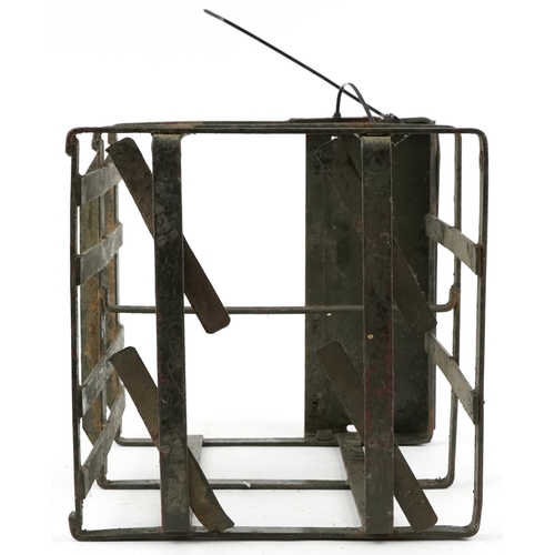 2538 - A military interest painted steel bomb cage, 48cm H x 38cm W x 38cm D.