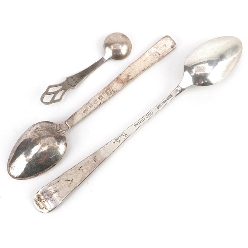 495 - Three silver spoons including one hand wrought by Cartier, the largest 13.5cm in length, total 33.5g... 