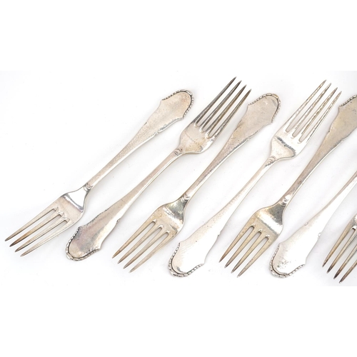 409 - Christian F Heise, a set of eight Danish silver table forks, 20cm in length.