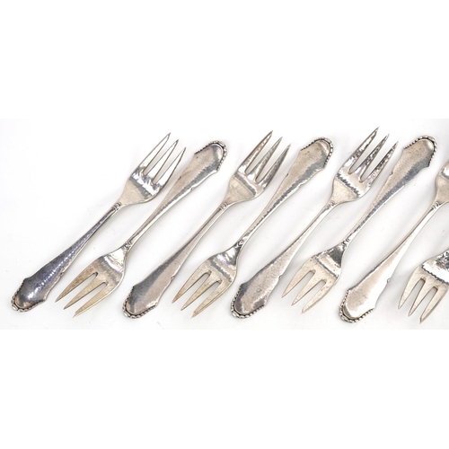 429 - Christian F Heise, a set of ten Danish silver cake forks, 14.5cm in length, total 232.0g.