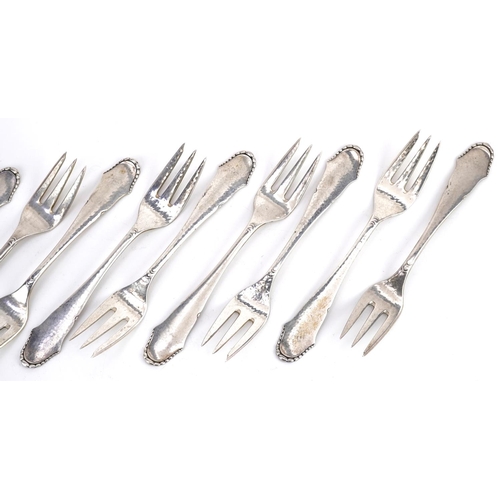 429 - Christian F Heise, a set of ten Danish silver cake forks, 14.5cm in length, total 232.0g.