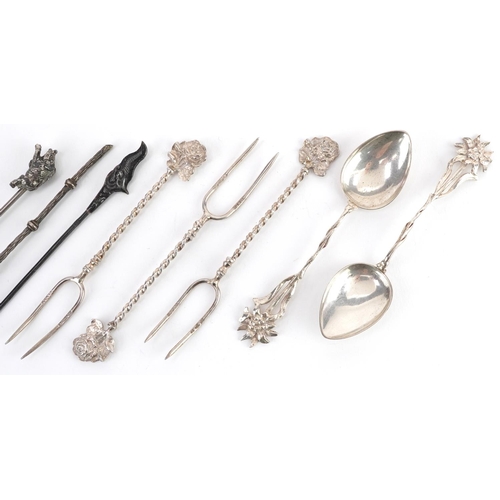 500 - Eight silver and white metal pickle forks and teaspoons, the largest 11cm in length, total 39.0g