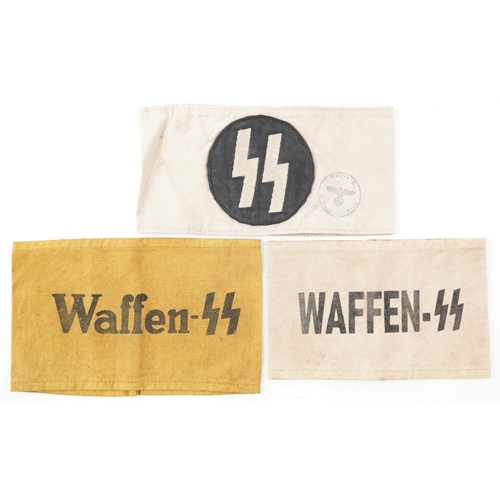 2578 - Three German military interest armbands.