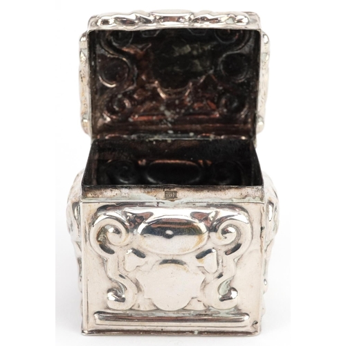 458 - An antique style Dutch silver box with hinged lid and embossed decoration, impressed marks to the ba... 