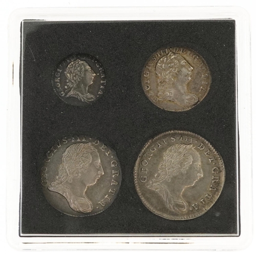 2062 - A 1780 George III silver Maundy money set comprising four coins housed in a black plastic case.