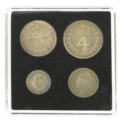 2059 - A 1932 George V Maundy money comprising four coins housed in a black plastic case.