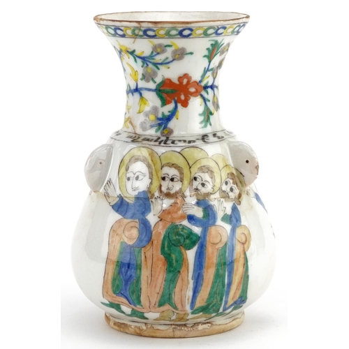 54 - A Turkish Armenian Ottoman vase hand painted with figures and flowers, 21cm high.