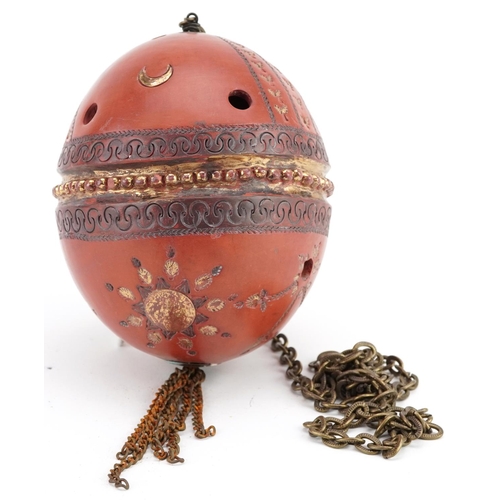 121 - A Turkish Ottoman Tophane hanging ball with gilded decoration, 14cm high.