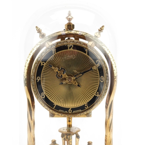 289 - A 20th century brass anniversary clock with glass dome having a gilt dial with Arabic numerals, the ... 