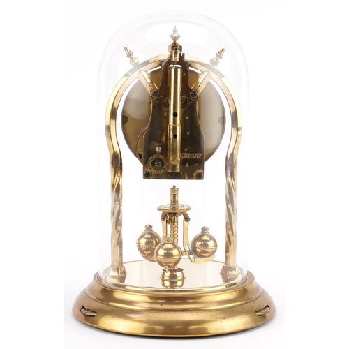 289 - A 20th century brass anniversary clock with glass dome having a gilt dial with Arabic numerals, the ... 