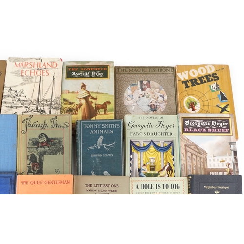 2388 - A group of various vintage hardback books to include The True Story of Dick Whittington and The Darl... 