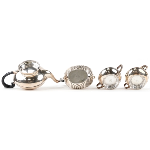 1436 - A plated three piece tea set together with a similar plated coffee pot.