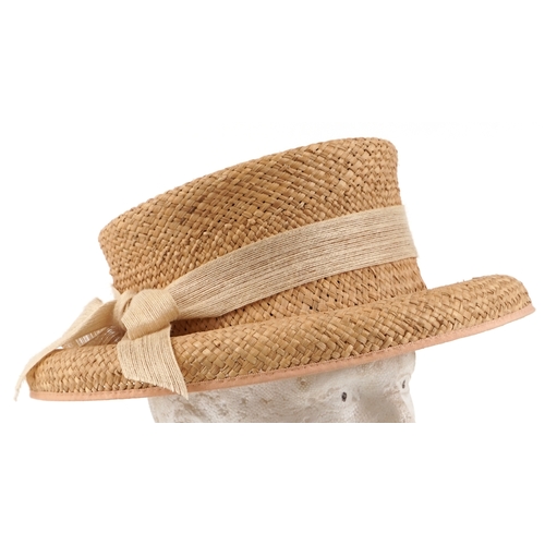 536 - A Paul Costelloe straw work ladies hat, retailed by Herald & Heart Hatters, London.