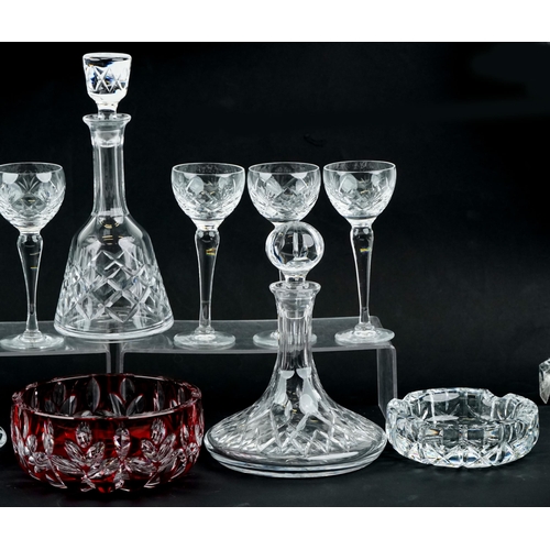 1498 - A group of cut glassware including two ship's decanters and six goblets, the largest 32cm high.