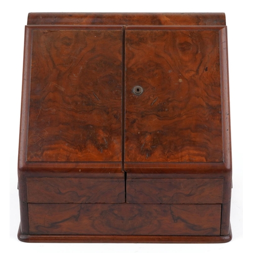 141 - A Victorian walnut stationary cabinet, the sloped front revealing division and two ink wells, H-34cm... 