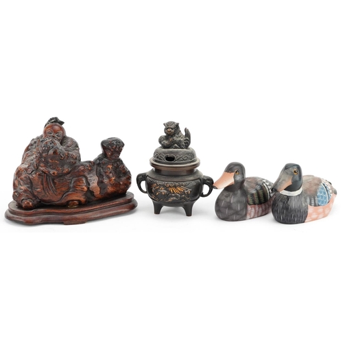 370 - Chinese objects comprising a carved burr wood figure of an elder, bronze three footed censer with co... 