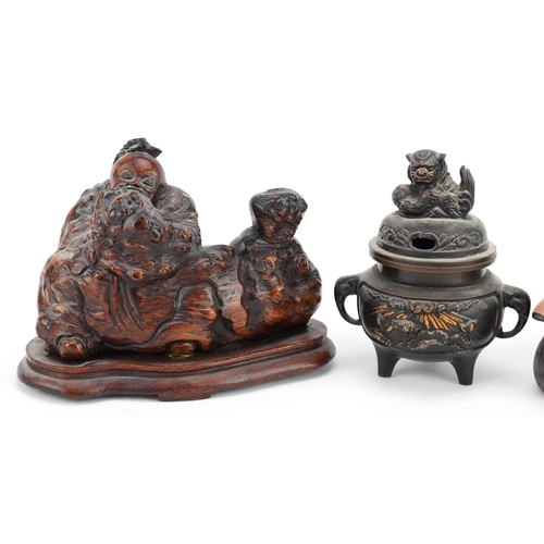 370 - Chinese objects comprising a carved burr wood figure of an elder, bronze three footed censer with co... 