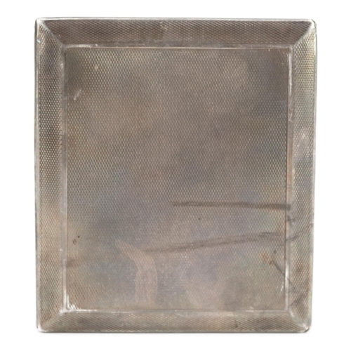 472 - Goldsmiths & Silversmiths Company Ltd, Art Deco engine turned silver cigarette case with slide to op... 