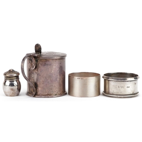 455 - Edwardian and later silver objects comprising a mustard with hinged lid, two napkin rings and a mini... 