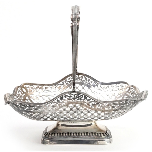 386 - S Blanckensee & Son Ltd, George VI pierced silver basket with swing handle, retailed by Munsey & Co ... 