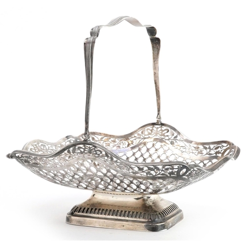 386 - S Blanckensee & Son Ltd, George VI pierced silver basket with swing handle, retailed by Munsey & Co ... 