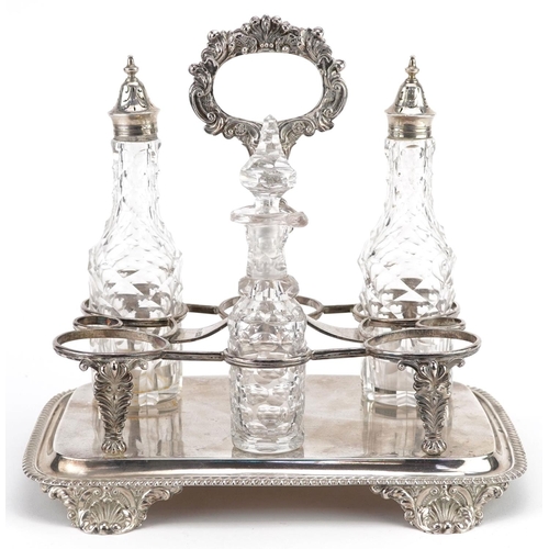 387 - Robert Hennell, a William IV silver six bottle cruet stand with three cut glass bottles, 23cm high, ... 