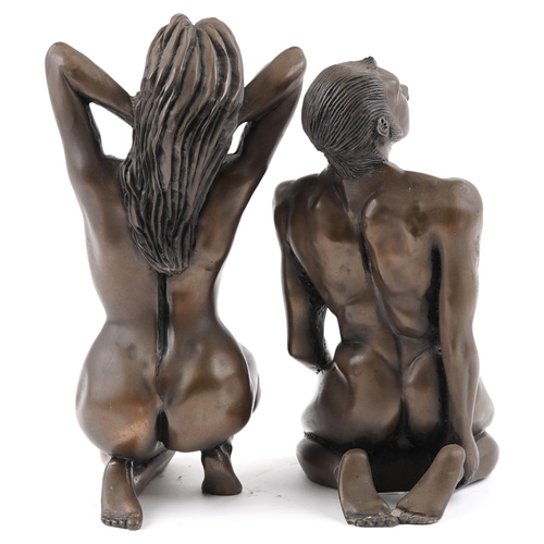 1483 - Two bronzed figural studies of nude male and female, the largest 35cm high.