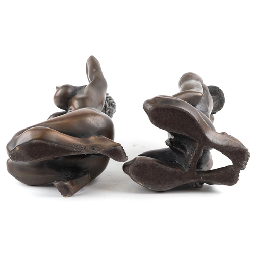 1483 - Two bronzed figural studies of nude male and female, the largest 35cm high.