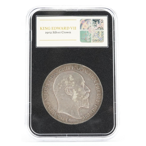 2110 - An Edward VII 1902 silver crown in an official plastic presentation case with certificate of authent... 