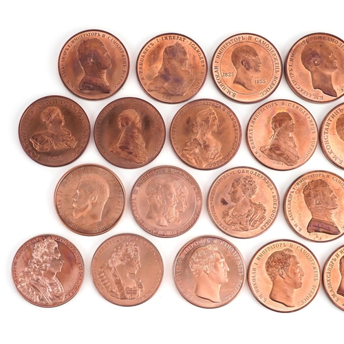 2117 - A collection of twenty five Russian copper proof pattern memorial rubles, each 38mm in diameter.