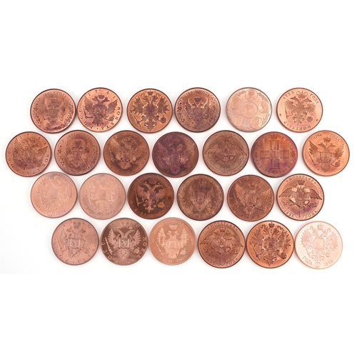 2117 - A collection of twenty five Russian copper proof pattern memorial rubles, each 38mm in diameter.