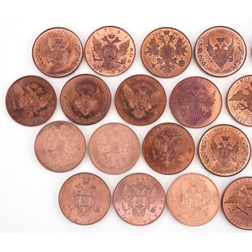 2117 - A collection of twenty five Russian copper proof pattern memorial rubles, each 38mm in diameter.