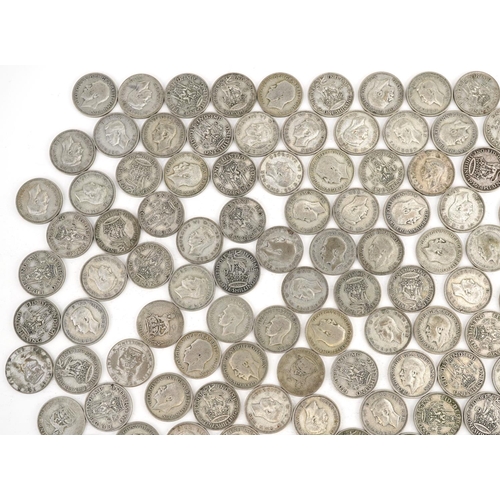 2121 - A quantity of pre 1947 shillings, 895g.