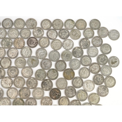 2121 - A quantity of pre 1947 shillings, 895g.