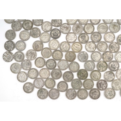 2121 - A quantity of pre 1947 shillings, 895g.