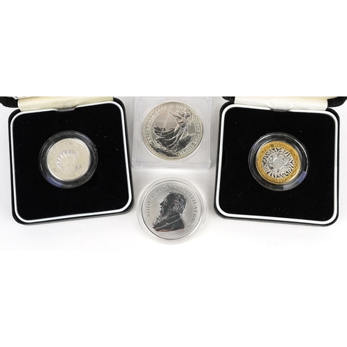 2109 - Four silver coins and an Isaac Newton fine silver proof medal, a Britannia 2000 one ounce fine silve... 