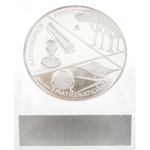 2109 - Four silver coins and an Isaac Newton fine silver proof medal, a Britannia 2000 one ounce fine silve... 