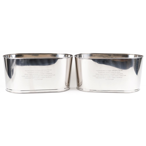 271 - A pair of polished metal Champagne ice buckets with Napoleon Bonaparte and Lily Bollinger mottos, ea... 