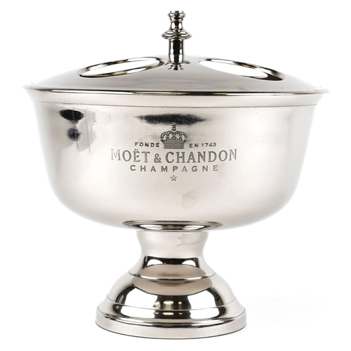 563 - A Moët & Chandon design four bottle Champagne ice bucket, 38cm high x 37cm in diameter.