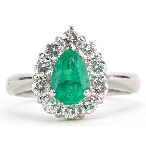  A platinum pear cut emerald and diamond cluster ring, the emeralds approximately 1.12 carat, total d... 