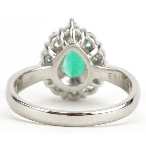  A platinum pear cut emerald and diamond cluster ring, the emeralds approximately 1.12 carat, total d... 