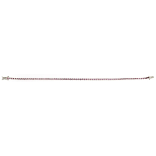 3022 - An 18ct white gold ruby line bracelet, total ruby weight approximately 3.21 carat, 17cm in length, 7... 