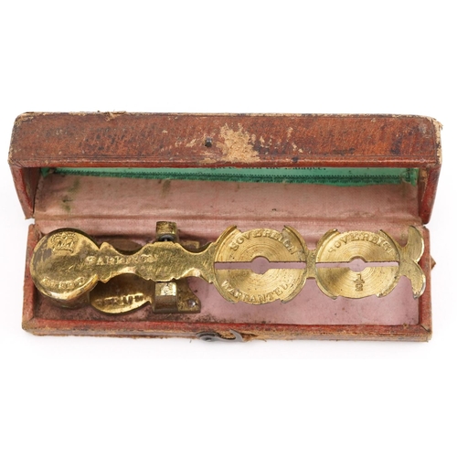 89 - A Victorian set of Harrison's Improved Sovereign balance scales with fitted case.