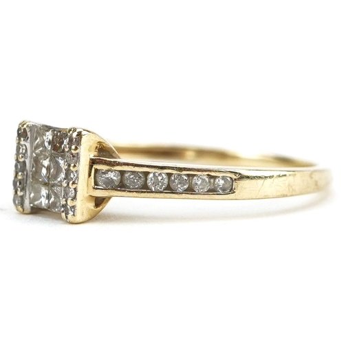 3059 - A 10k gold diamond square cluster ring with diamond set shoulders, size R, 2.6g