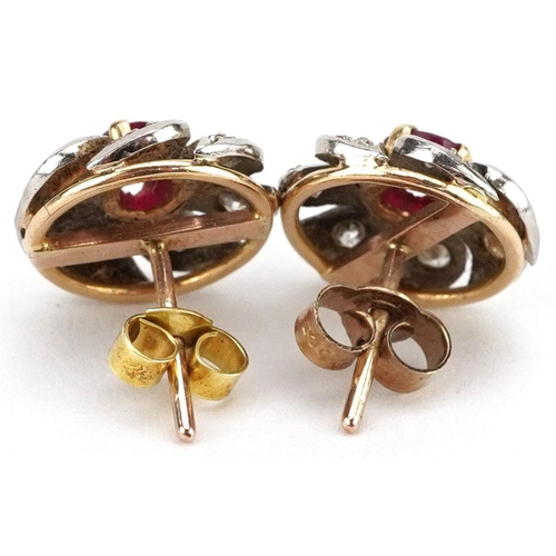 3025 - A pair of antique unmarked gold ruby and diamond swirling cluster stud earrings, 12mm in diameter, t... 