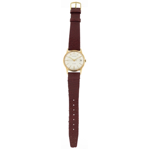 3043 - Garrard, a gentlemen's 9ct gold Garrard automatic wristwatch having silvered dial with date aperture... 