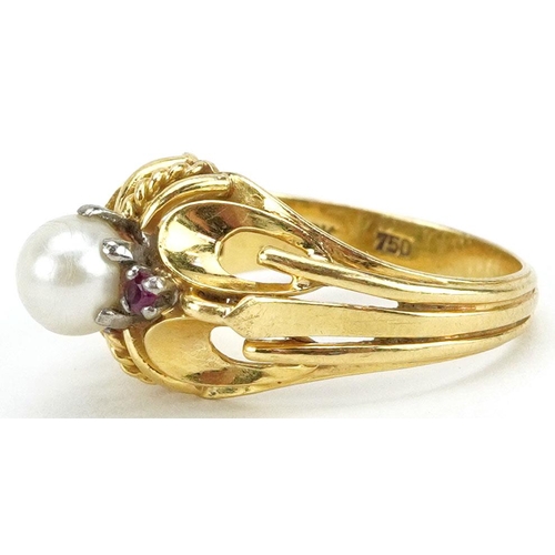 3016 - An 18ct gold cultured pearl and ruby ring engraved Handarbeit, size N, 5.1g