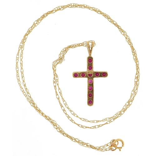 3073 - A 9ct gold pink spinel cross pendant on a 9ct gold necklace, 2.6cm high and 46cm in length, total 1.... 